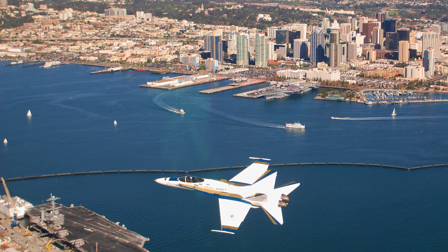 U.S. Navy Cmdr. Craig Reiner flies an F/A-18C Hornet strike fighter from Fleet Readiness Center Southwest over Naval Air Station North Island